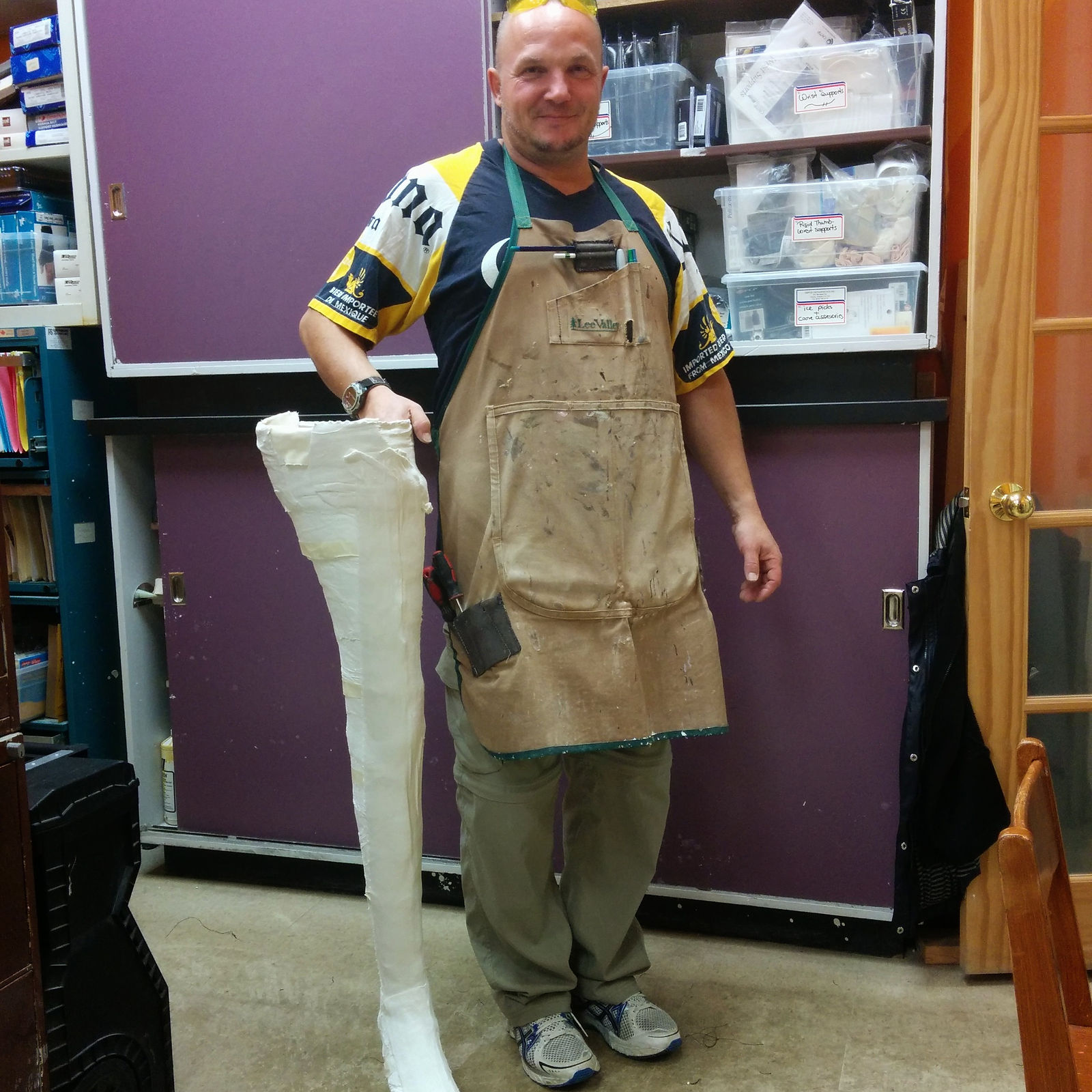 Adrian with a very tall leg cast for a KAFO