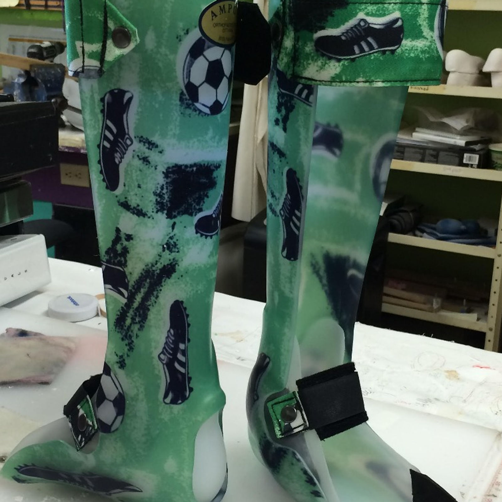 Green Soccer bilateral rigid AFOs with SMO inserts